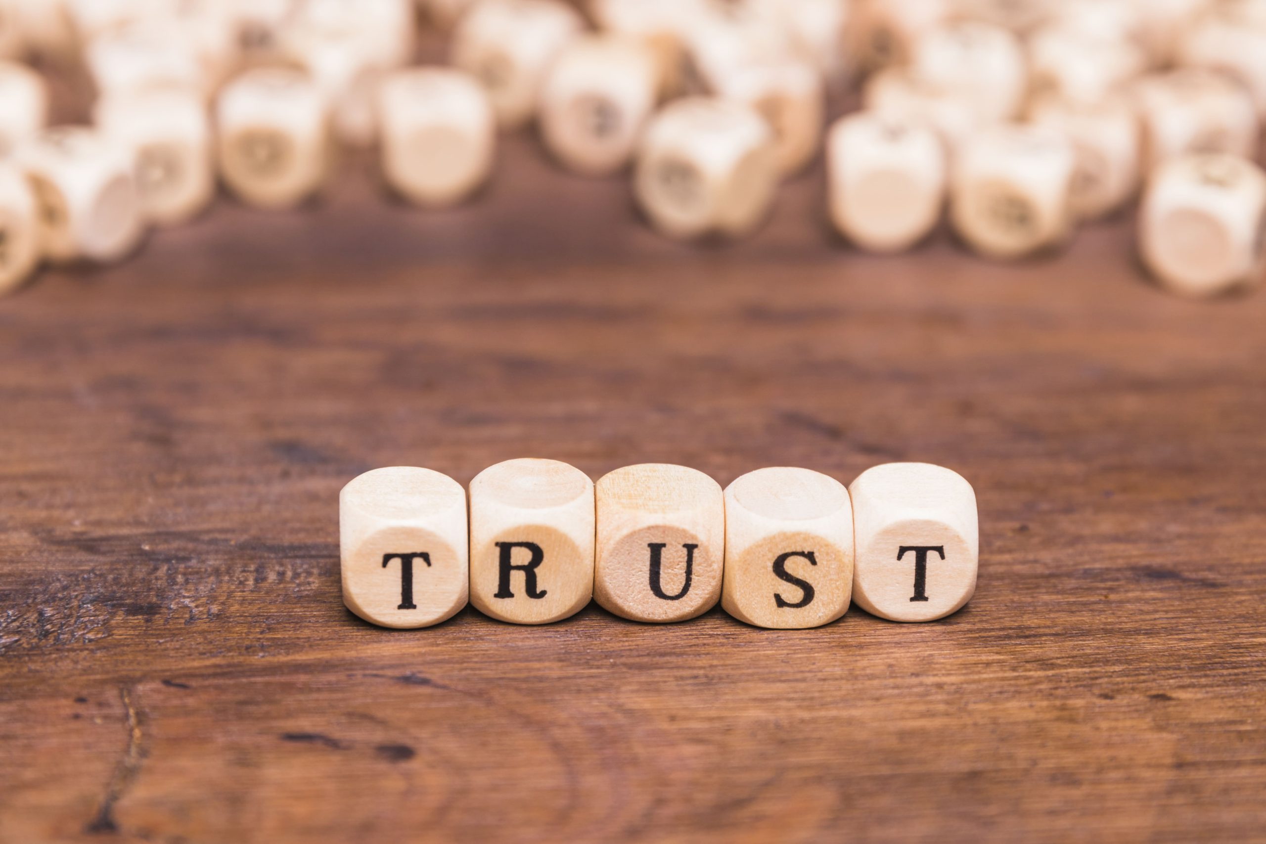 trust-word-made-with-wooden-blocks-1-scaled.jpg