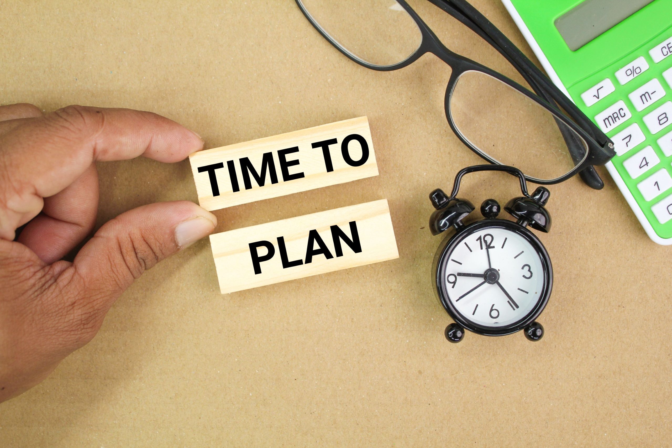 glasses-calculator-alarm-clock-with-words-time-plan-concept-time-tp-plan-2-scaled.jpg