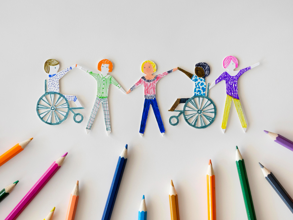 multi-ethnic-disabled-people-community-with-pencils-1.jpg