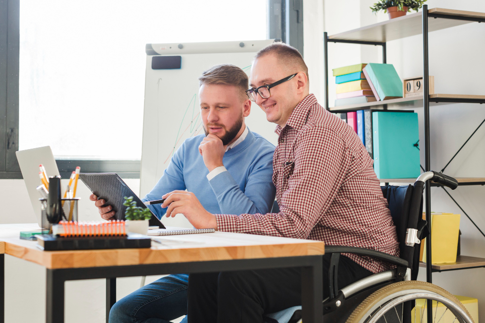 positive-disabled-worker-together-with-manager-office-1.jpg