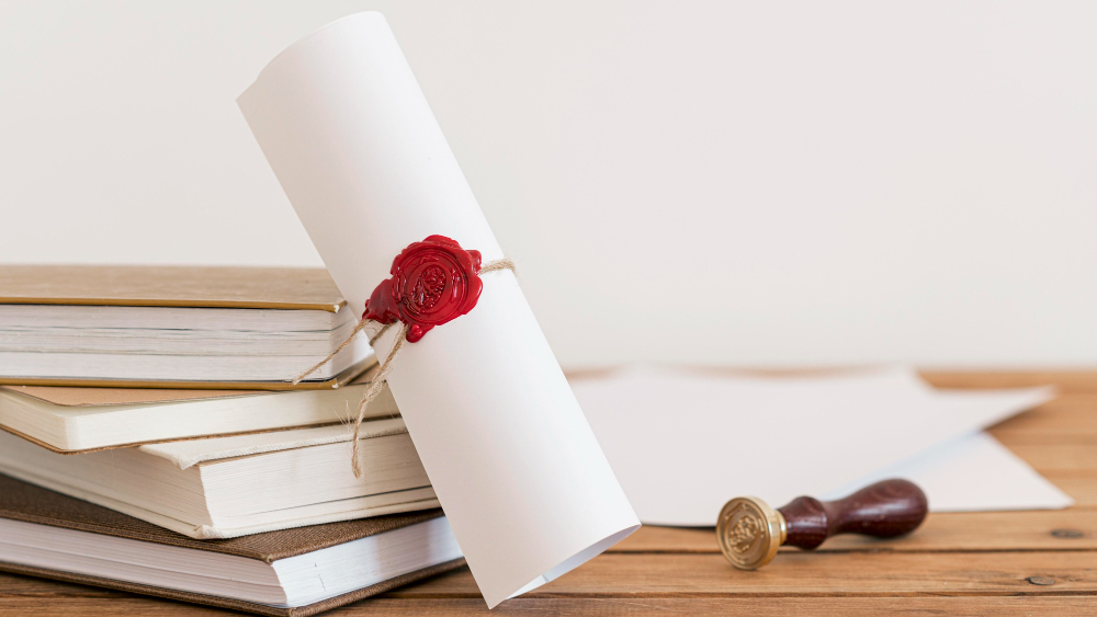 certificate-with-ribbon-bow-office-desk.jpg